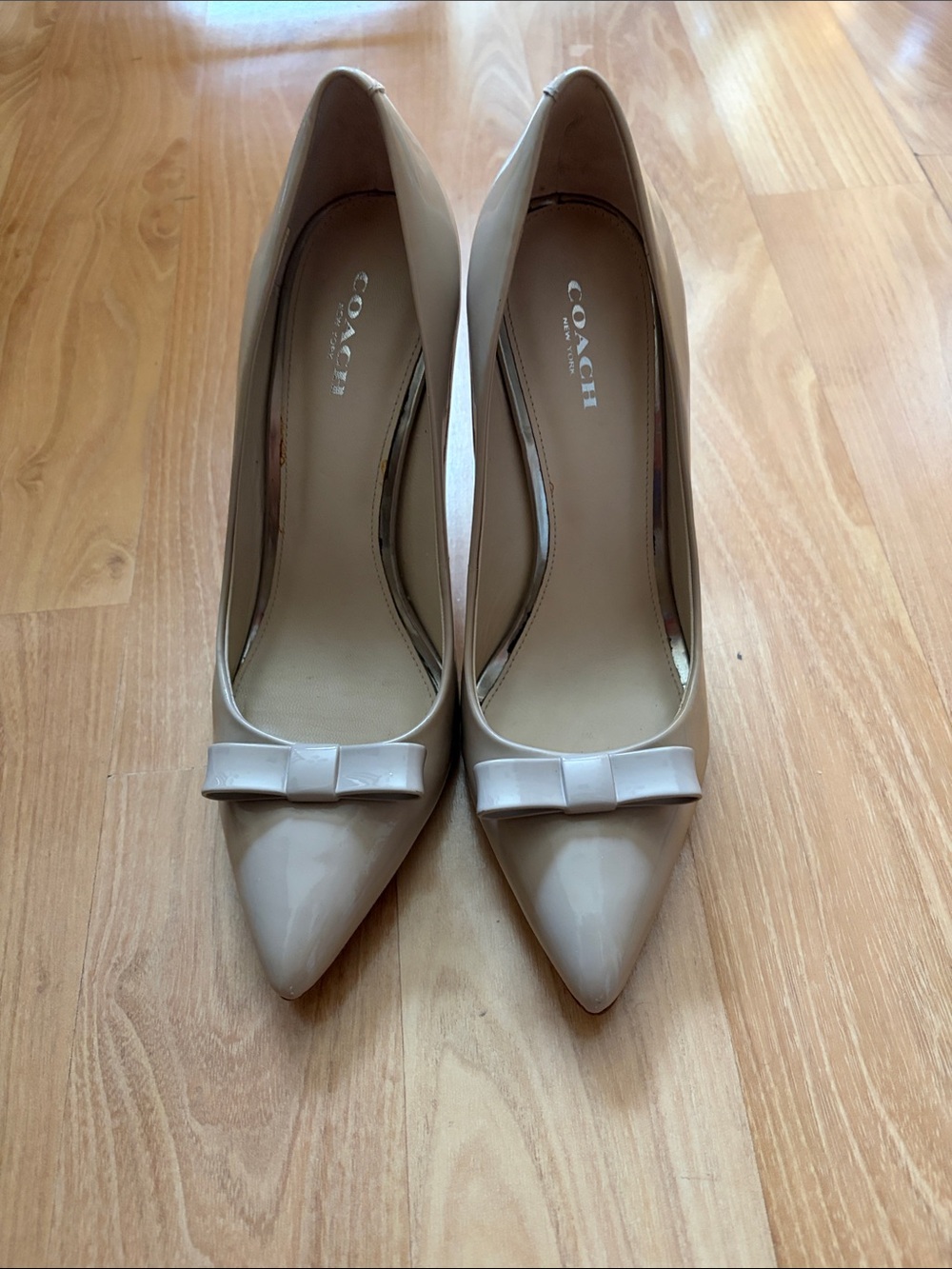 Coach Nude Beige tan Patent Leather Pointed-Toe Pumps with Bow